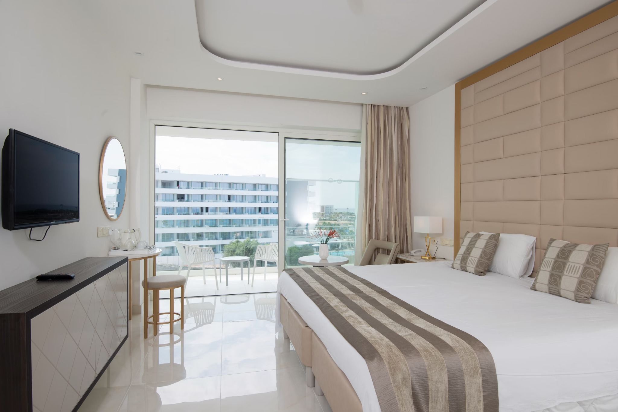 Guest room at Constantinos The Great Beach Hotel